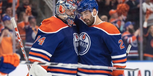Stuart Skinner and a teammate