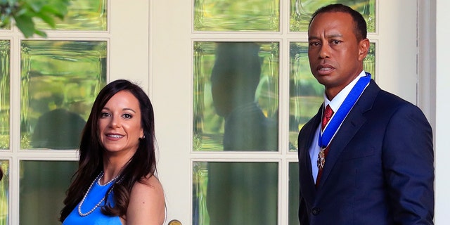 Tiger Woods y Erica Herman en la Casa Blanca