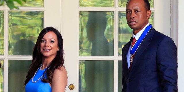 Tiger Woods y Erica Herman en la Casa Blanca