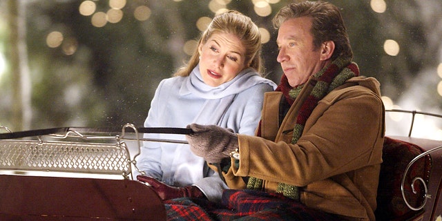 Tim Allen and Elizabeth Mitchell filming a scene for "The Santa Clause 2."