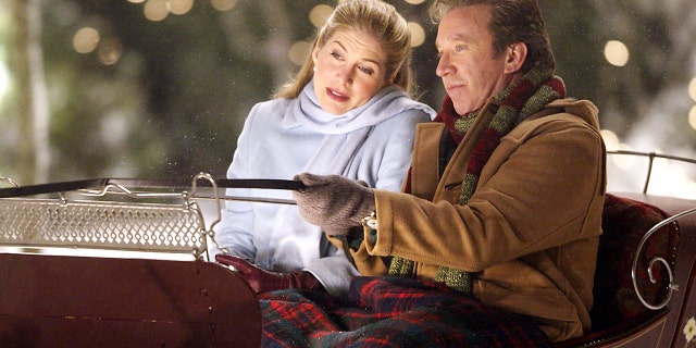 Tim Allen and Elizabeth Mitchell filming a scene for "The Santa Clause 2."