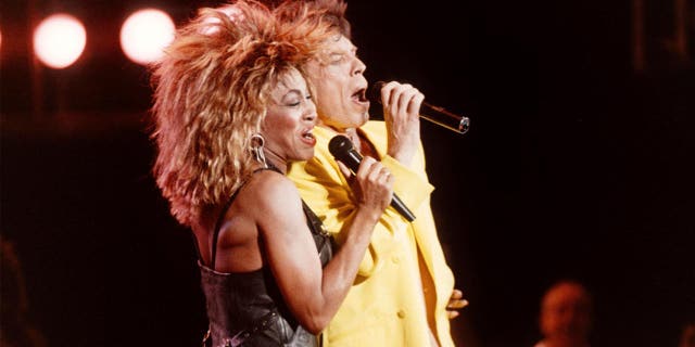 Mick Jagger, and Tina Turner on stage together