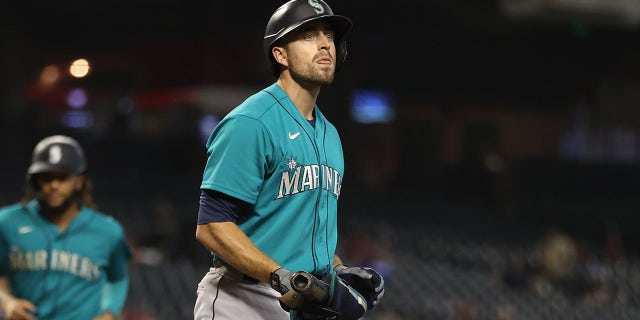 Tom Murphy walks off field