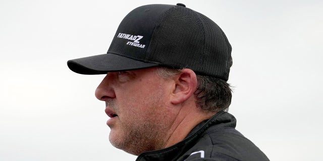 Tony Stewart looks on during practice