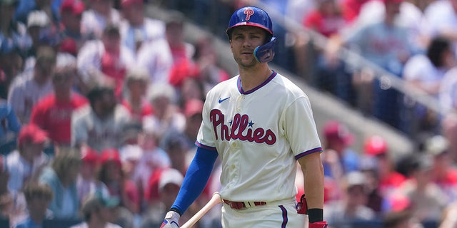 Trea Turner looks on during a game