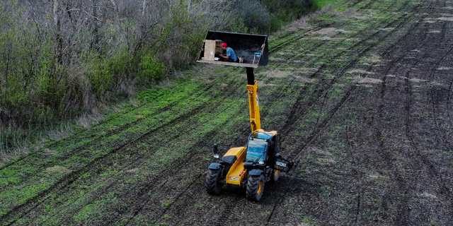 Ukraine tractor clearing mines is remote controlled