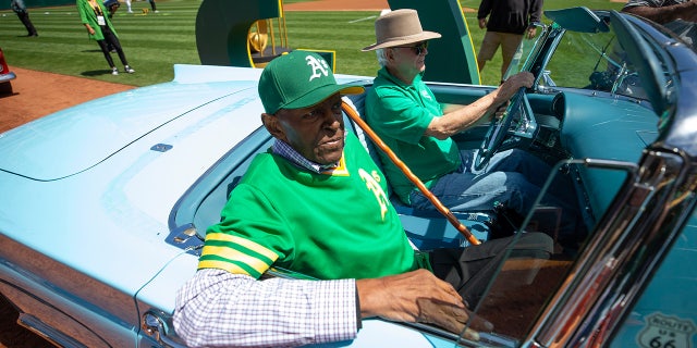 Vida Blue rides in a car