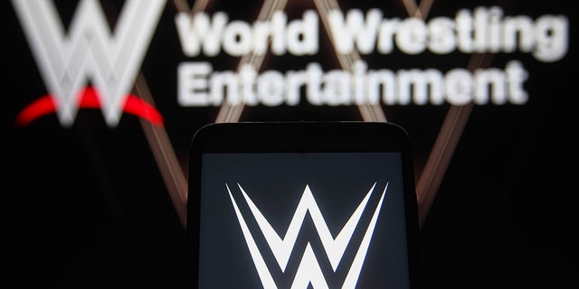 WWE logo on smartphone