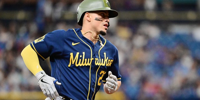 Willy Adames runs around the bases