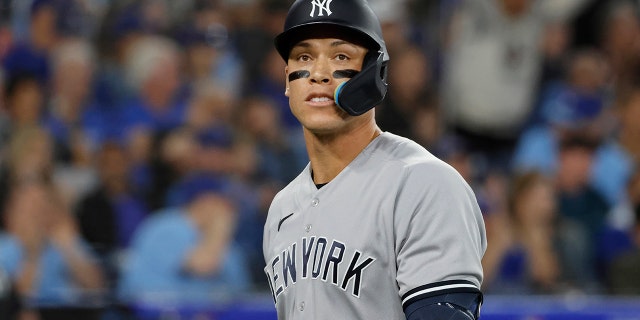 Aaron Judge walks off the field