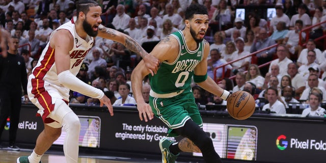 Jayson Tatum is driving to the hoop