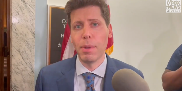 Anti-'Terminator': AI not a 'creature' working toward self-awareness, OpenAI CEO Altman says 3 Sam Altman with the press