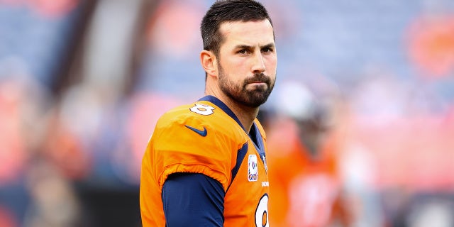 Brandon McManus looks on field