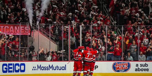 Hurricanes huddle after goal