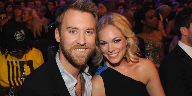 Josh Kelley smiling with Cassie McConnell