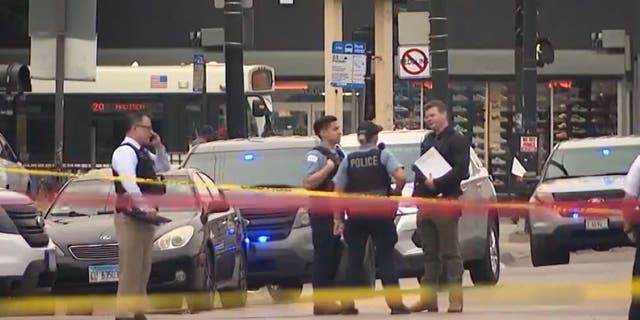 Police outside library shooting scene