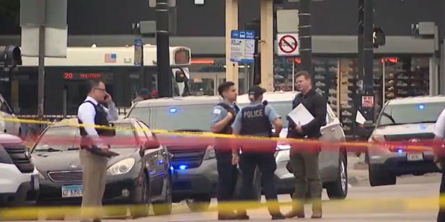Police outside library shooting scene