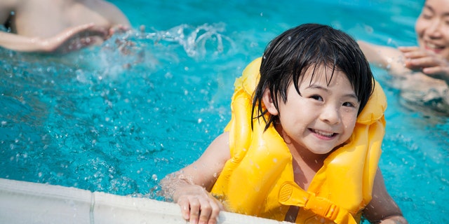 Child in life jacket