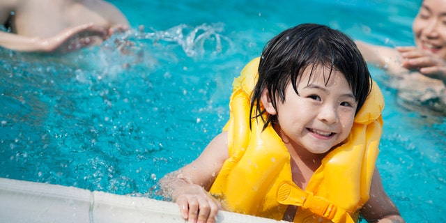 Child in life jacket