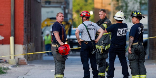 Crews at the scene of a Davenport building collapse