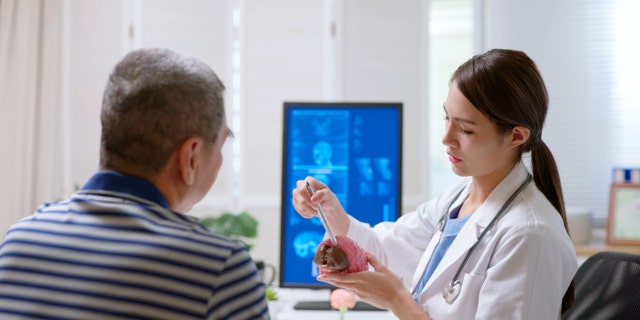 Dementia doctor with patient