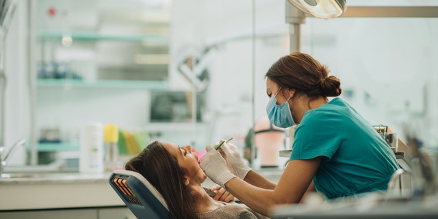 Woman at dentist