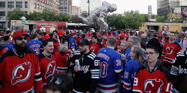 Devils fans outside arena