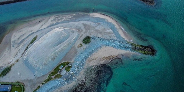 drone photo showing dolphin likeness