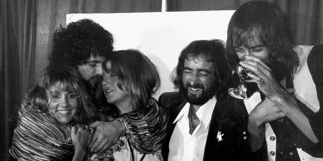 Fleetwood Mac bandmembers backstage at the LA Rock Awards in 1977