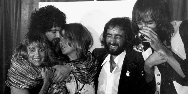 Fleetwood Mac bandmembers backstage at the LA Rock Awards in 1977