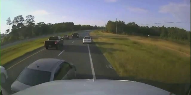 cars slowing down on road
