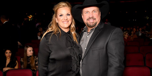 Garth Brooks with Trisha Yearwood at an event