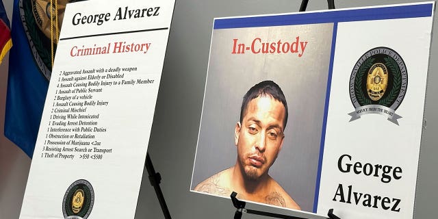 Poster board with George Alvarez mugshot and criminal record