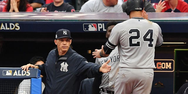 Gary Sanchez high fives Joe Girardi