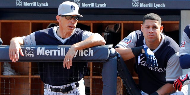 Joe Girardi y Gary Sánchez