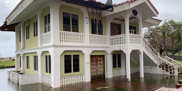 Guam ‘very blessed’ as Typhoon Mawar leaves with no reported deaths 2 guam house flooded