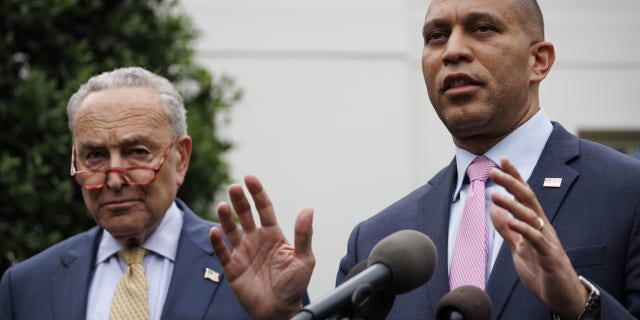 Democratic congressional leaders Hakeem Jeffries and Chuck Schumer speak to the media