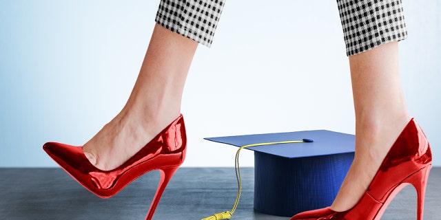 woman wearing red high heels