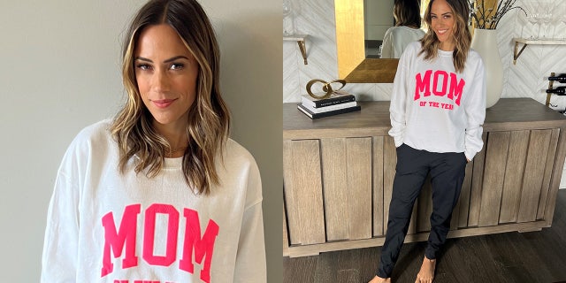 Jana Kramer wears cozy sweatshirt she designed