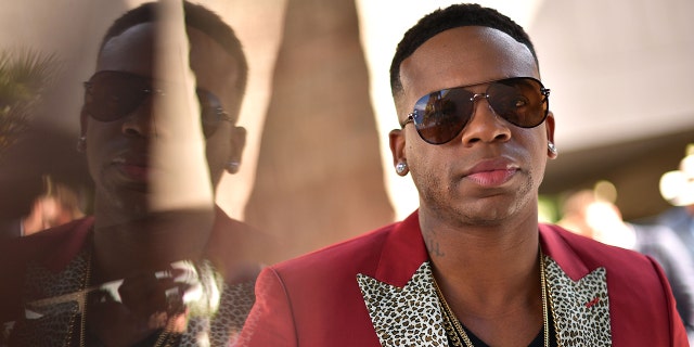 Jimmie Allen wearing sunglasses