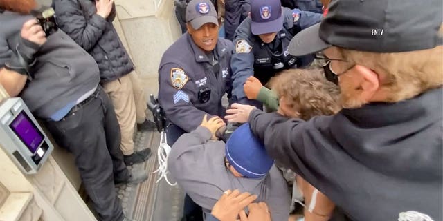 Protestors clash with police during Jordan Neely protest