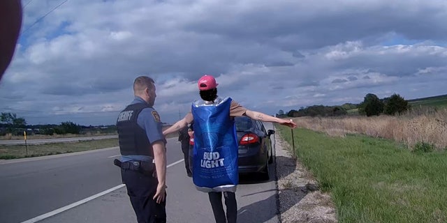 suspected drunken driver in Bud Light costume