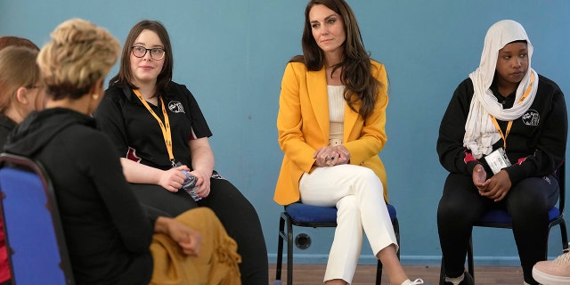 Kate Middleton listening to teens in Bath, England