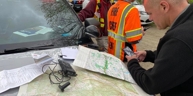 search crew and map of area