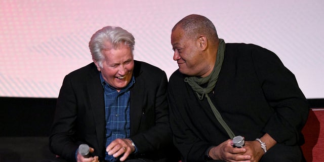 Laurence Fishburne and Martin Sheen laughing