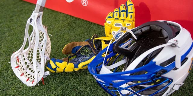 lacrosse helmet and gloves
