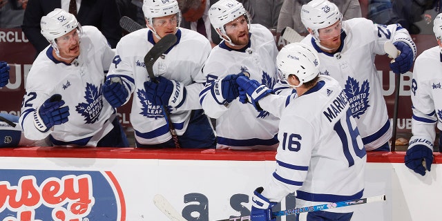 Mitchell Marner greets teammates