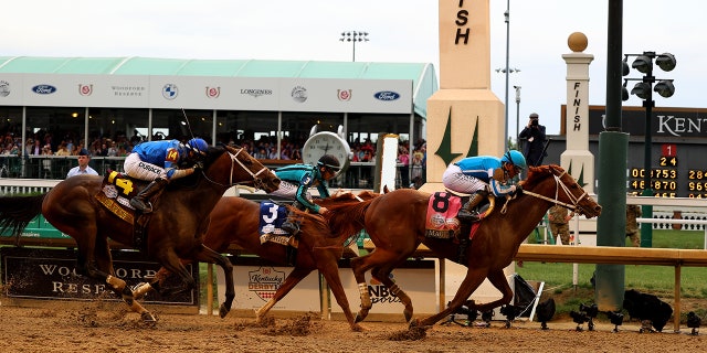 Mage winning Kentucky Derby