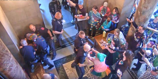 Protester punching a trooper in Nebraska