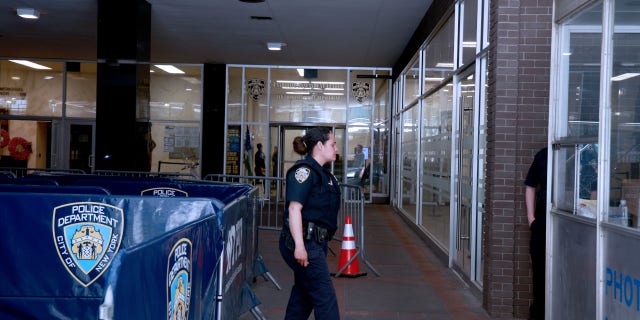 NYPD Officers are pictured at the old Police Academy on 20th Street and Third Avenue in Manhattan